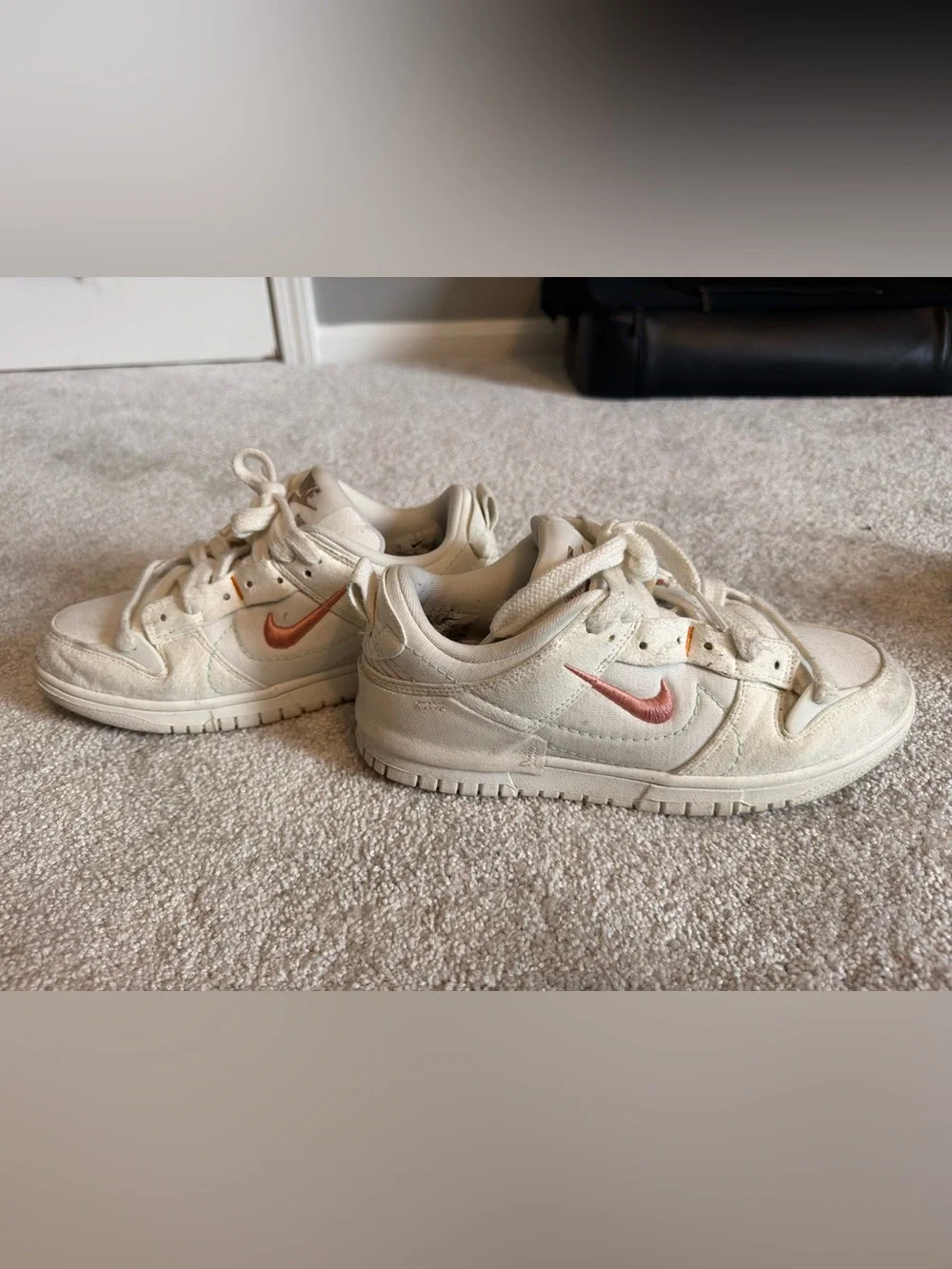 Nike Low-Top Dunks in Cream with Metallic Rose
